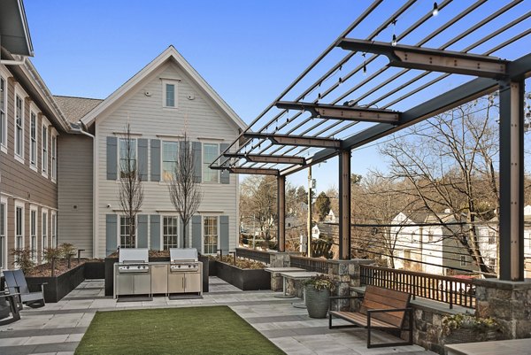 Spacious patio with modern furniture at Darien Commons Apartments, luxury living by Greystar