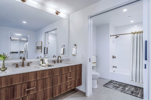 Modern bathroom with sleek fixtures at 212 Stuart Apartments