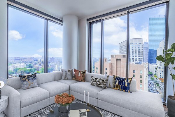 Cozy living room with modern furnishings at 212 Stuart Apartments, luxury Greystar property in Boston
