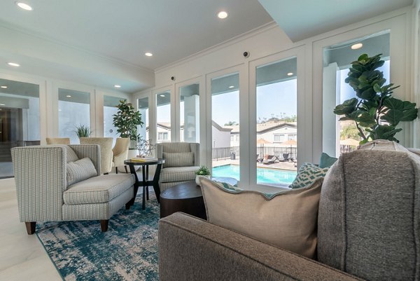 Inviting clubhouse at Towne at Glendale Apartments with modern decor and cozy seating areas