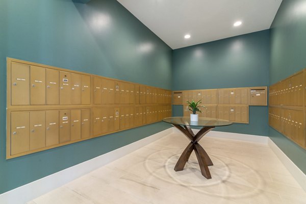 Modern mail room with secure package lockers at Towne at Glendale Apartments