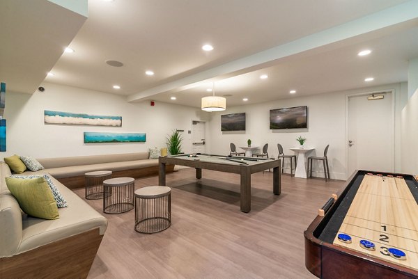 Game room with billiards and modern decor at Towne at Glendale Apartments, offering luxury leisure spaces