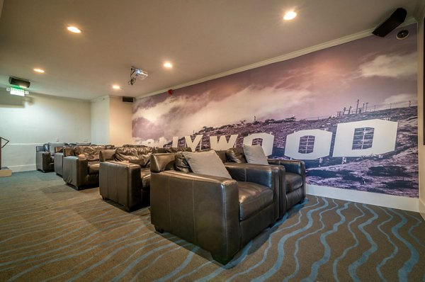 Modern theater with plush seating at Towne at Glendale Apartments