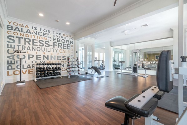 Fitness center with modern equipment at Towne at Glendale Apartments for residents' active lifestyle