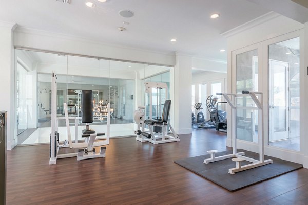 Fitness center featuring modern equipment at Towne at Glendale Apartments, offering luxury amenities for an active lifestyle