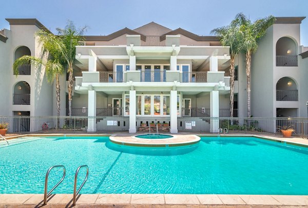 Resort-style pool at Towne at Glendale Apartments offering a luxurious swimming experience in a serene setting