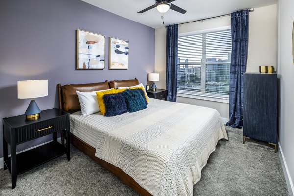Modern bedroom with chic decor at Broadstone SoBro Apartments, a luxury Greystar residence in vibrant downtown Nashville