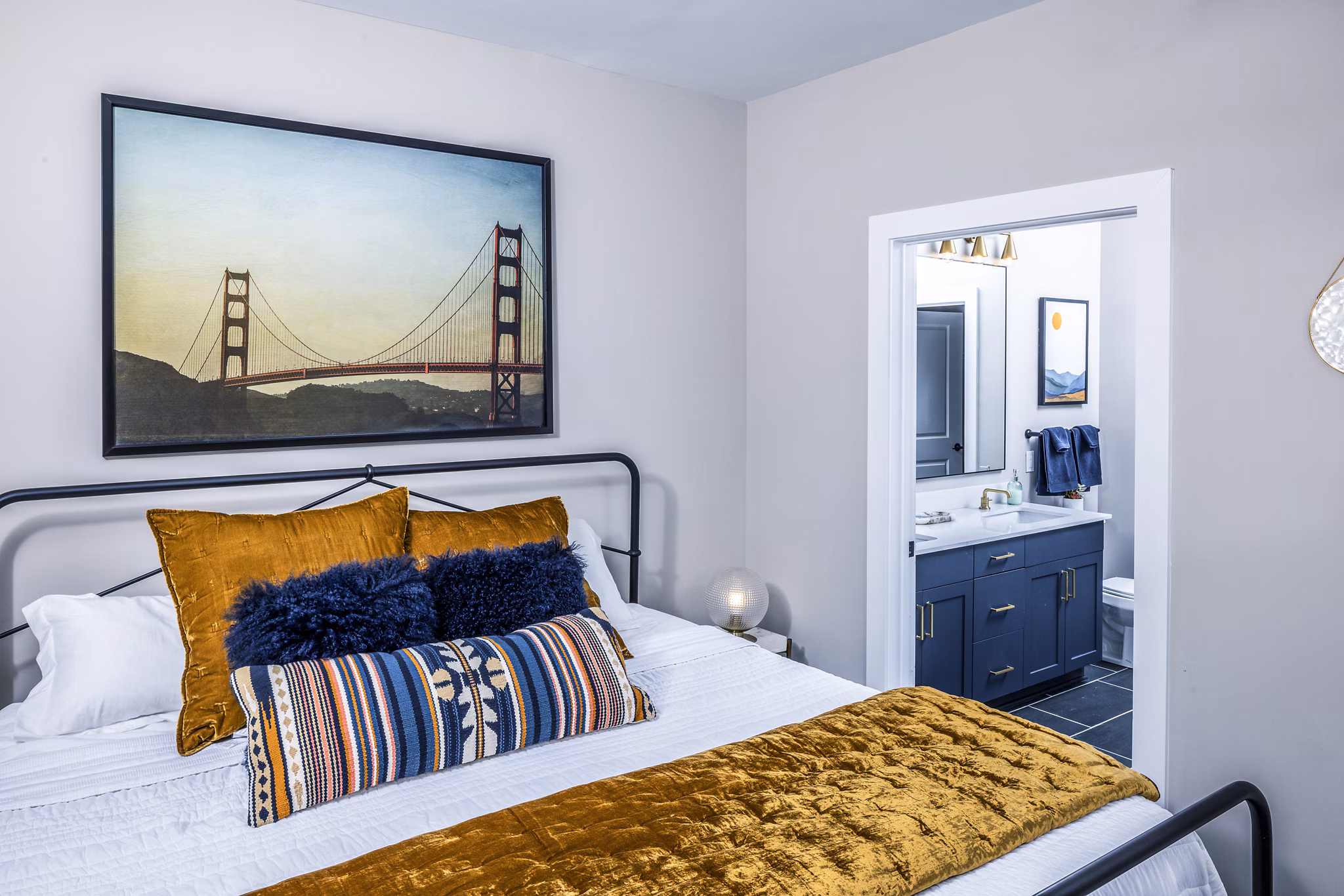 Broadstone SoBro Apartments: Modern bedroom with stylish decor and large windows in Nashville luxury apartments