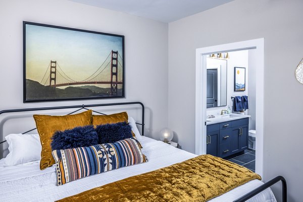 Broadstone SoBro Apartments: Modern bedroom with stylish decor and large windows in Nashville luxury apartments