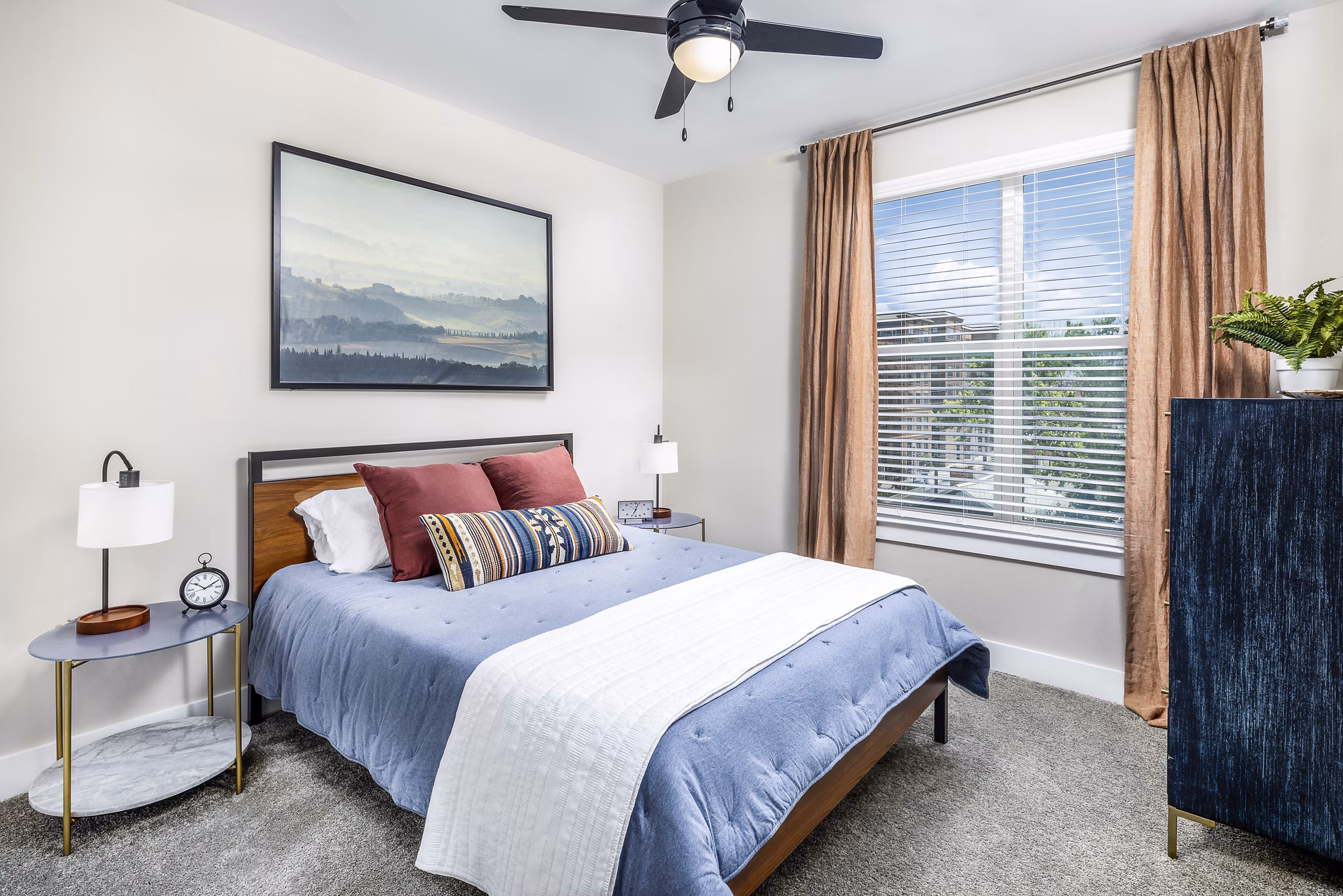 Modern bedroom with stylish decor at Broadstone SoBro Apartments