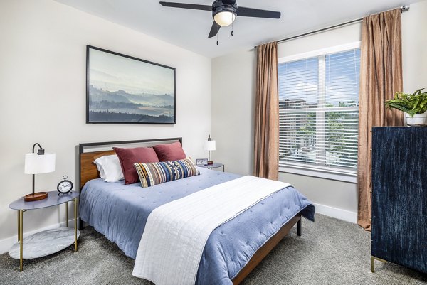 Modern bedroom with stylish decor at Broadstone SoBro Apartments