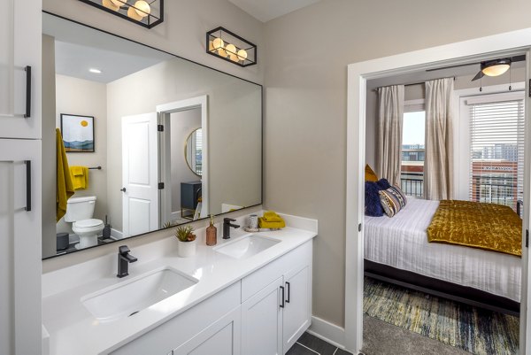 Modern bathroom with sleek fixtures at Broadstone SoBro Apartments, featuring luxury details and spacious design in a desirable location