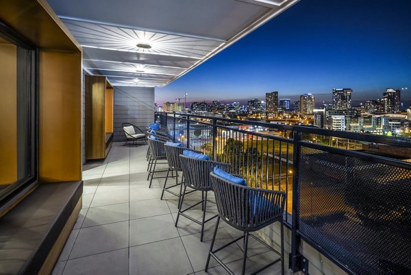 Stylish clubhouse with modern lounge seating and ambient lighting at Broadstone SoBro Apartments