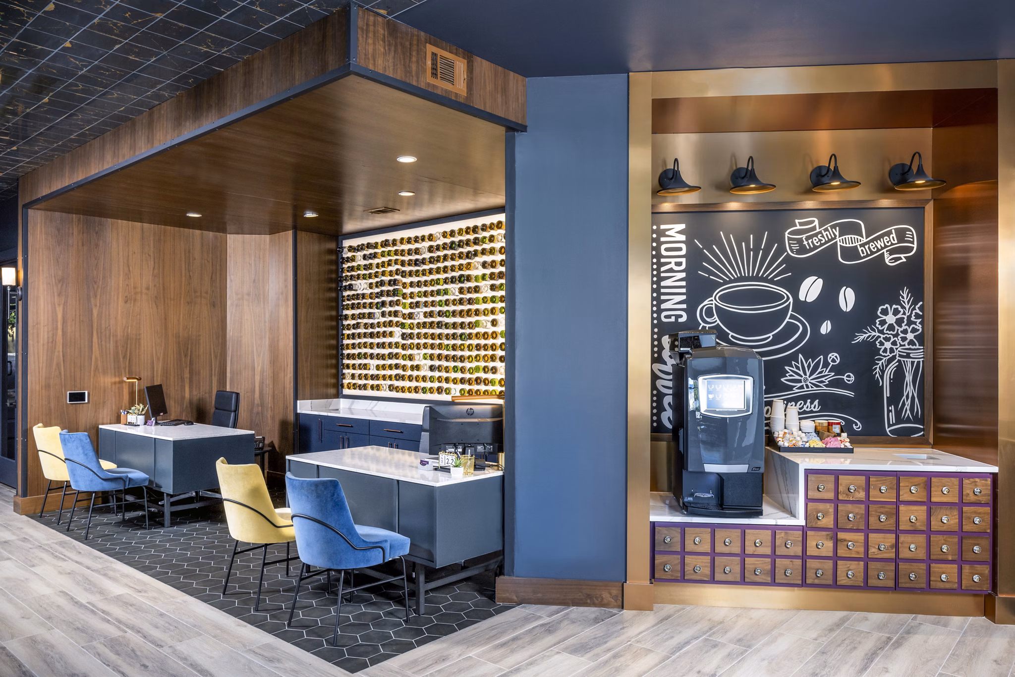 Stylish clubhouse lobby with modern decor at Broadstone SoBro Apartments, ideal for social gatherings and relaxation