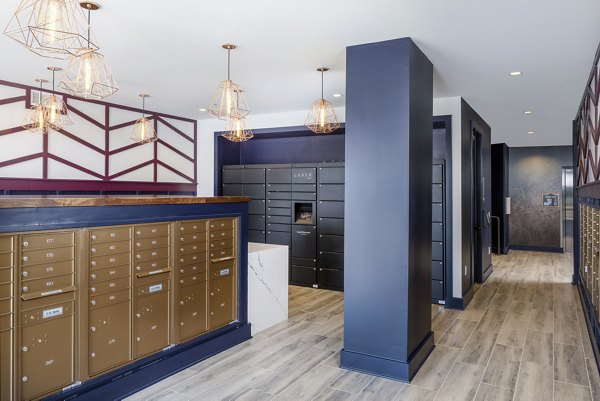 Mail room with secure package lockers at Broadstone SoBro Apartments, Nashville
