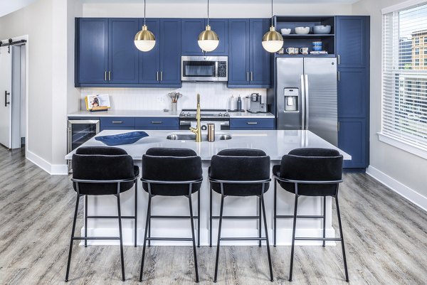 Modern kitchen with stainless steel appliances at Broadstone SoBro Apartments