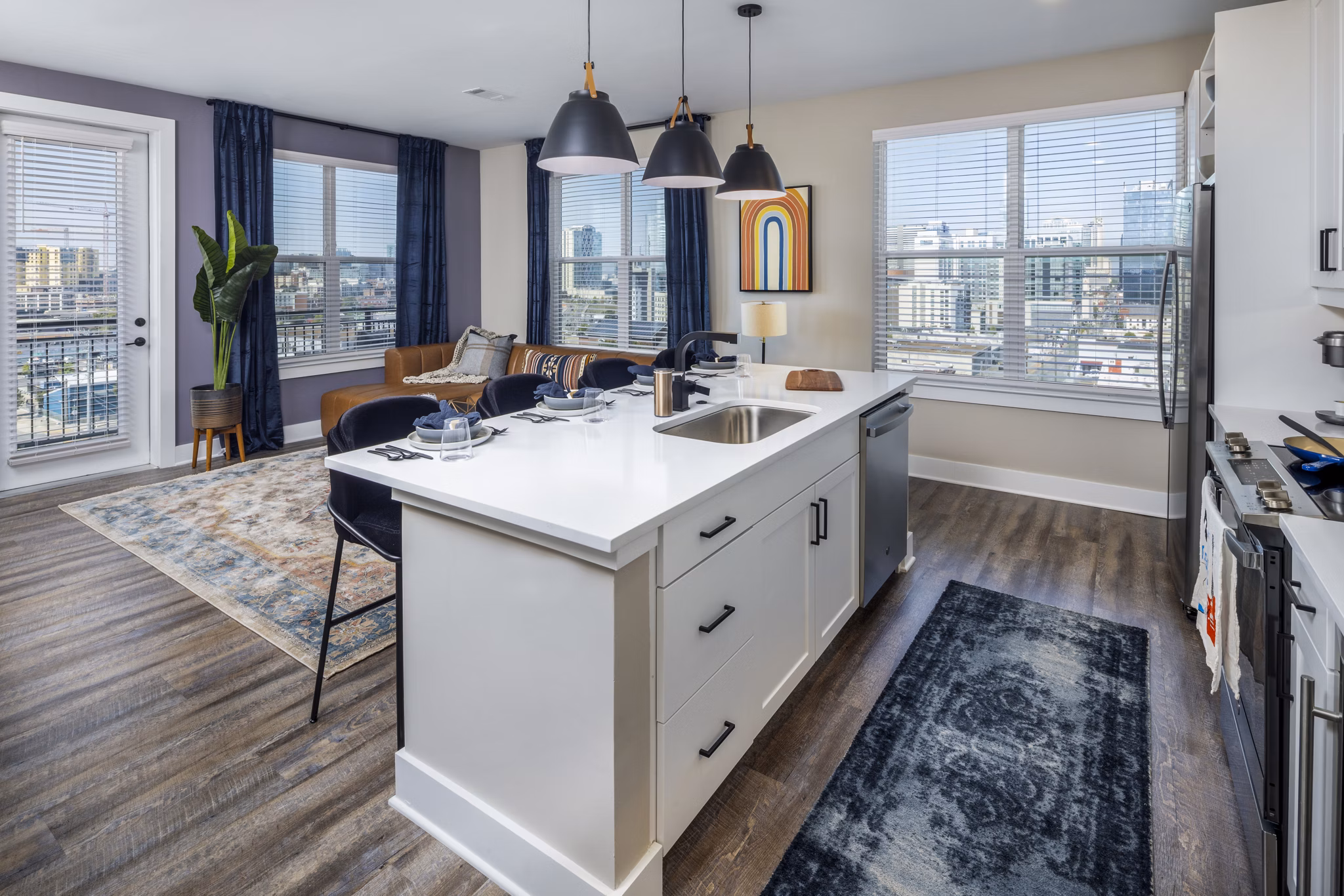 Modern kitchen with stainless steel appliances at Broadstone SoBro Apartments