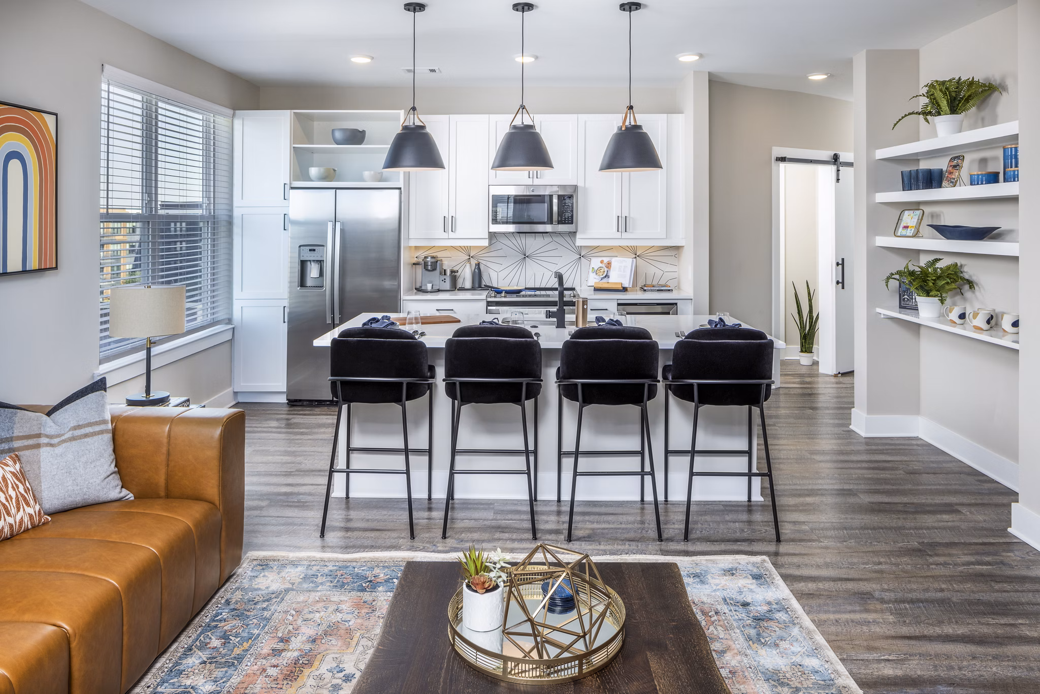 Modern kitchen with sleek countertops and stainless steel appliances at Broadstone SoBro Apartments in Nashville, offering luxury living spaces