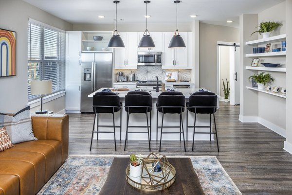Modern kitchen with sleek countertops and stainless steel appliances at Broadstone SoBro Apartments in Nashville, offering luxury living spaces
