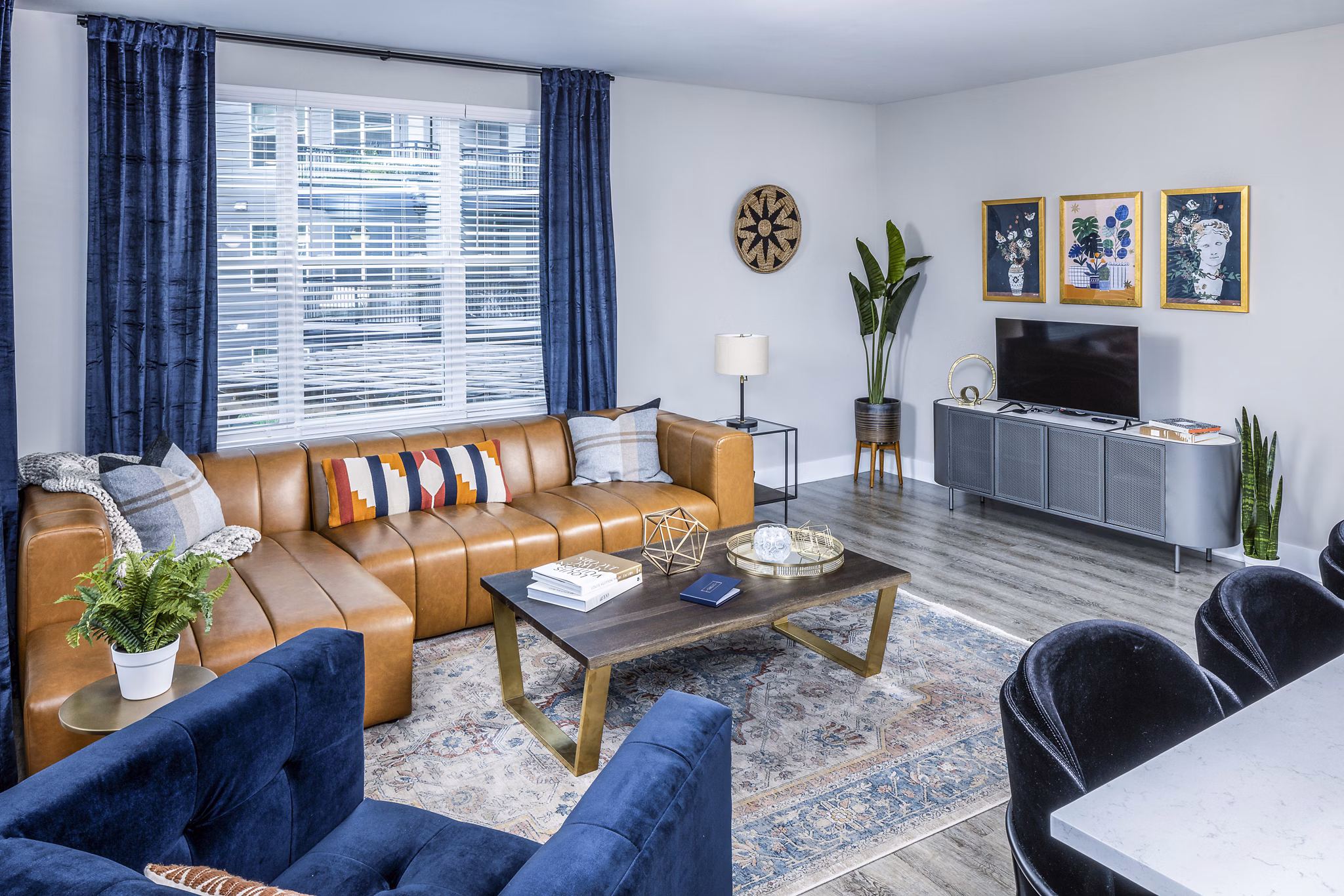 Modern living room with elegant furnishings at Broadstone SoBro Apartments, offering a luxurious residential experience in an upscale community