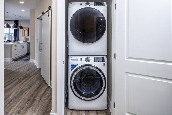 Modern laundry room with high-efficiency washers at Broadstone SoBro Apartments