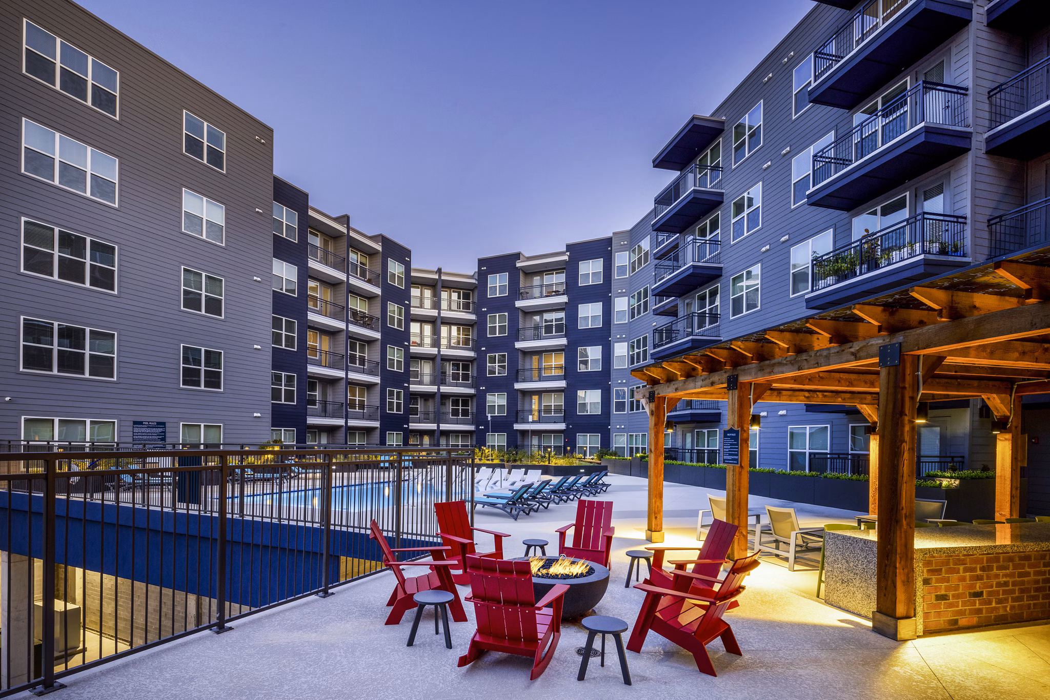 Cozy fire pit near pool at Broadstone SoBro Apartments offering luxury living in Nashville