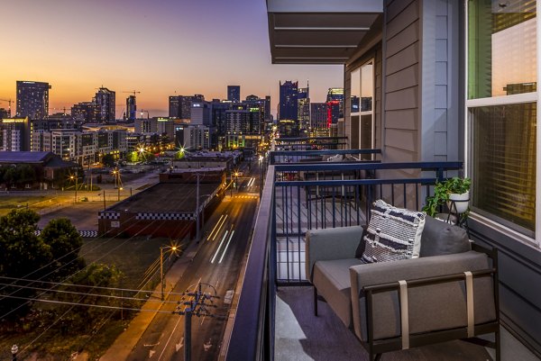 Outdoor patio with modern furnishings at Broadstone SoBro Apartments