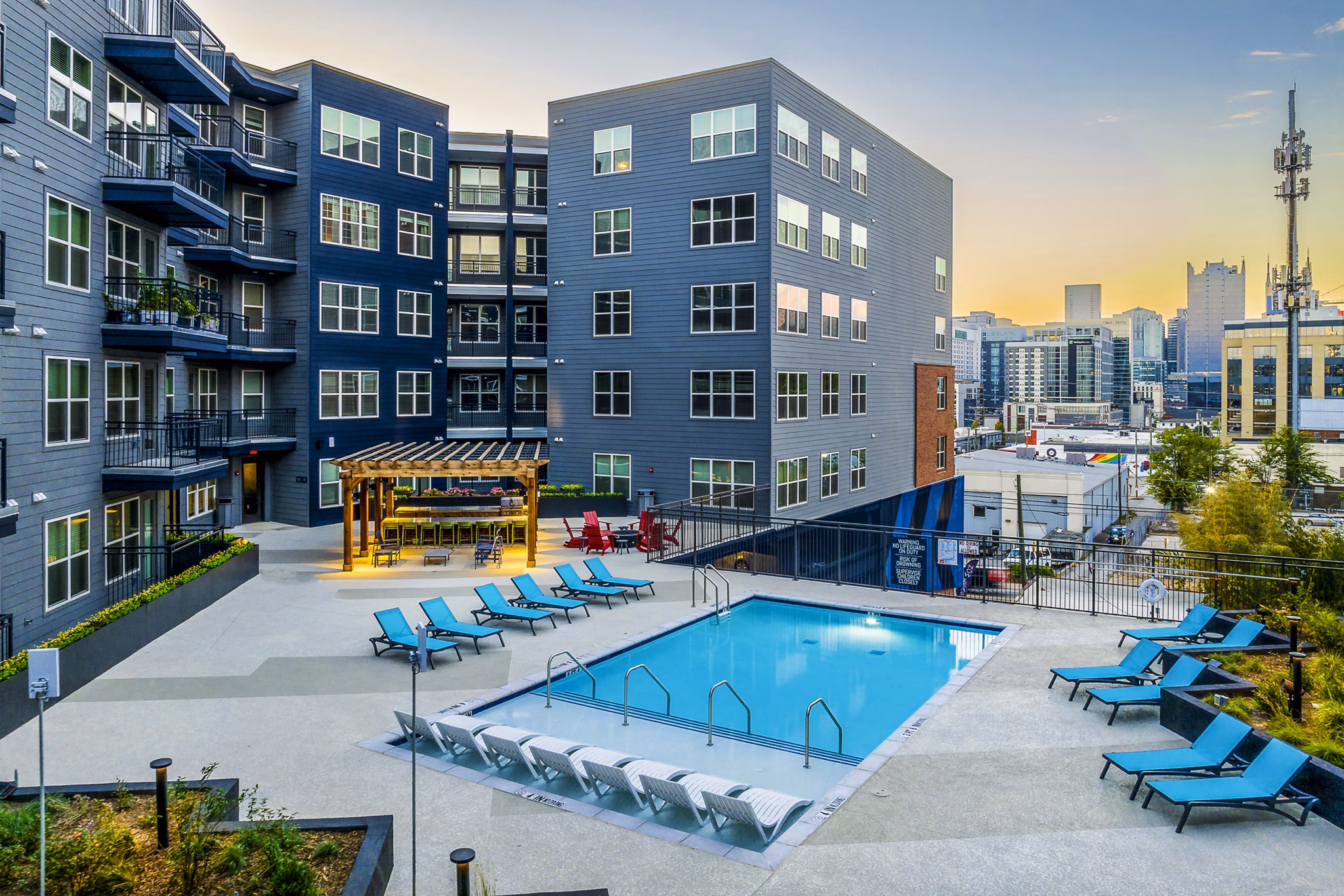 Rooftop swimming pool with city views at Broadstone SoBro Apartments, Nashville