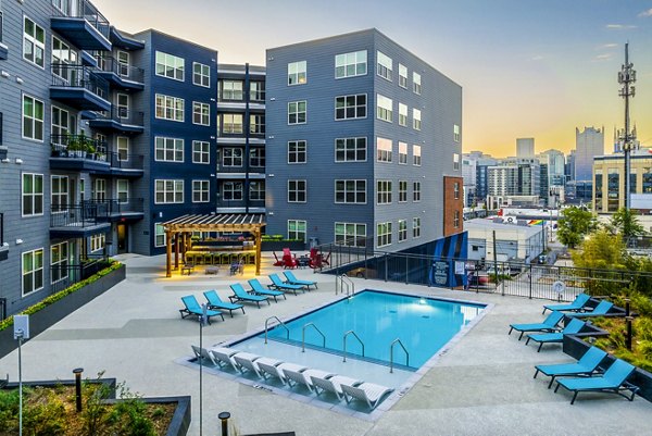 Rooftop swimming pool with city views at Broadstone SoBro Apartments, Nashville