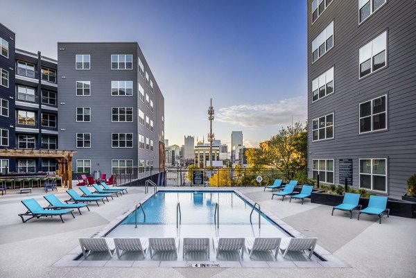 Luxury pool with cabanas at Broadstone SoBro Apartments in Nashville, ideal for relaxation and gatherings