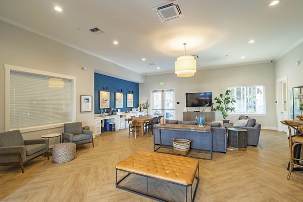 Clubhouse featuring modern furniture and recreational space at Park on 20th Apartments