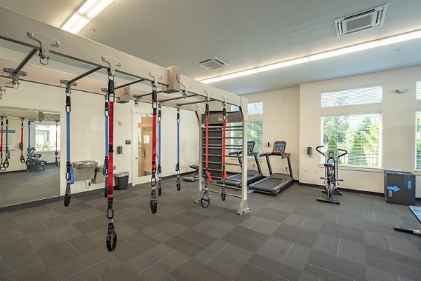 State-of-the-art fitness center with modern equipment at Park on 20th Apartments