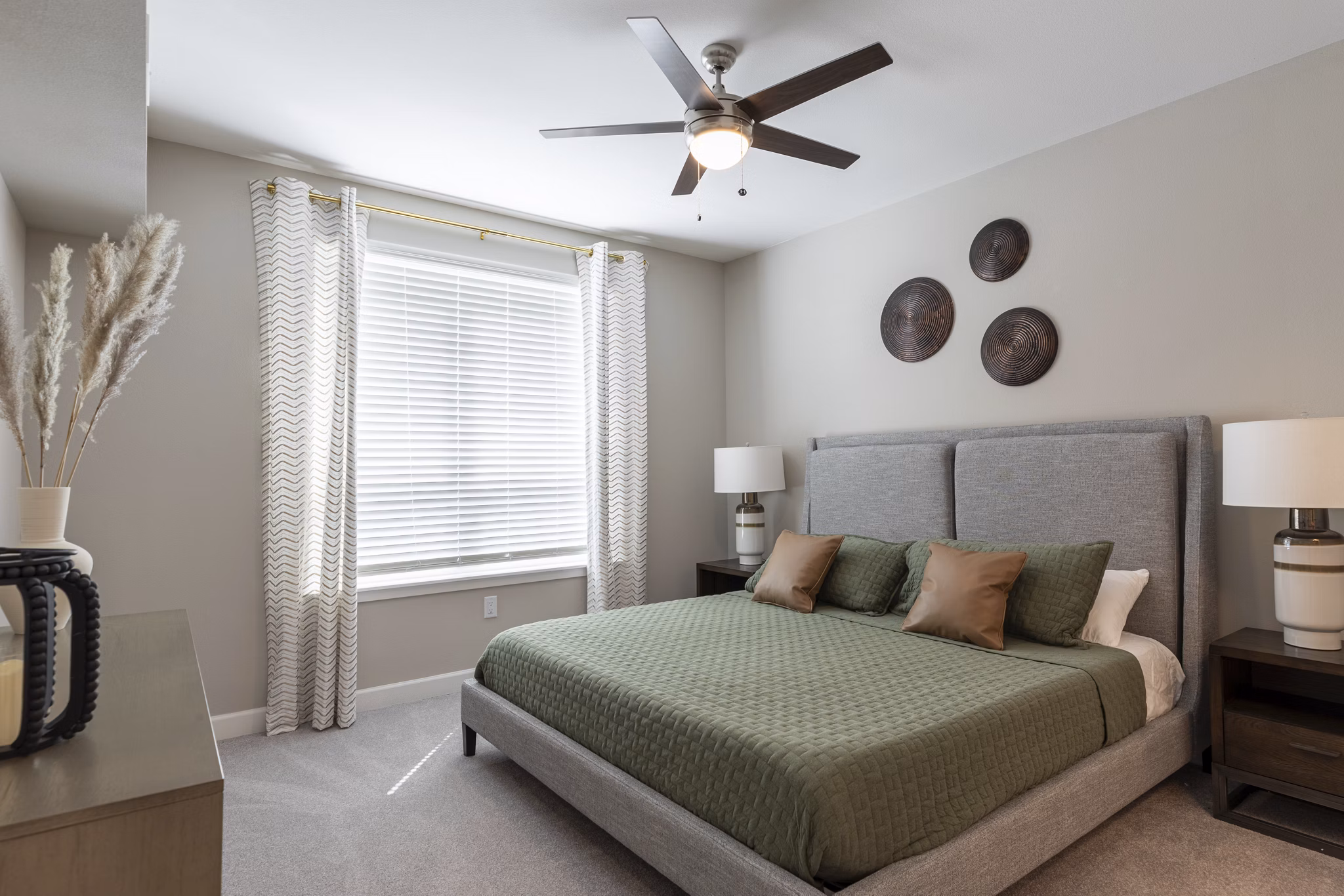 Bedroom Interior Template: Elegant bedroom with modern decor at Avenida at Centerra Apartments