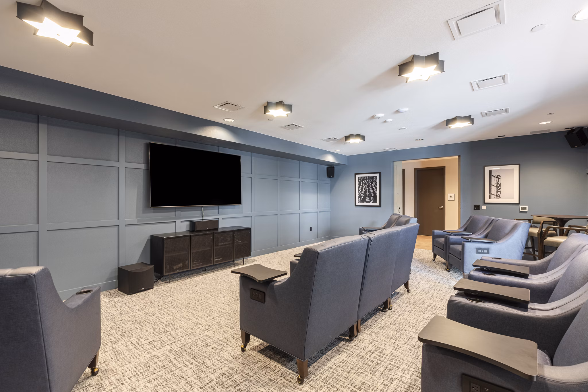 Theater featuring plush seating and modern design at Avenida at Centerra Apartments