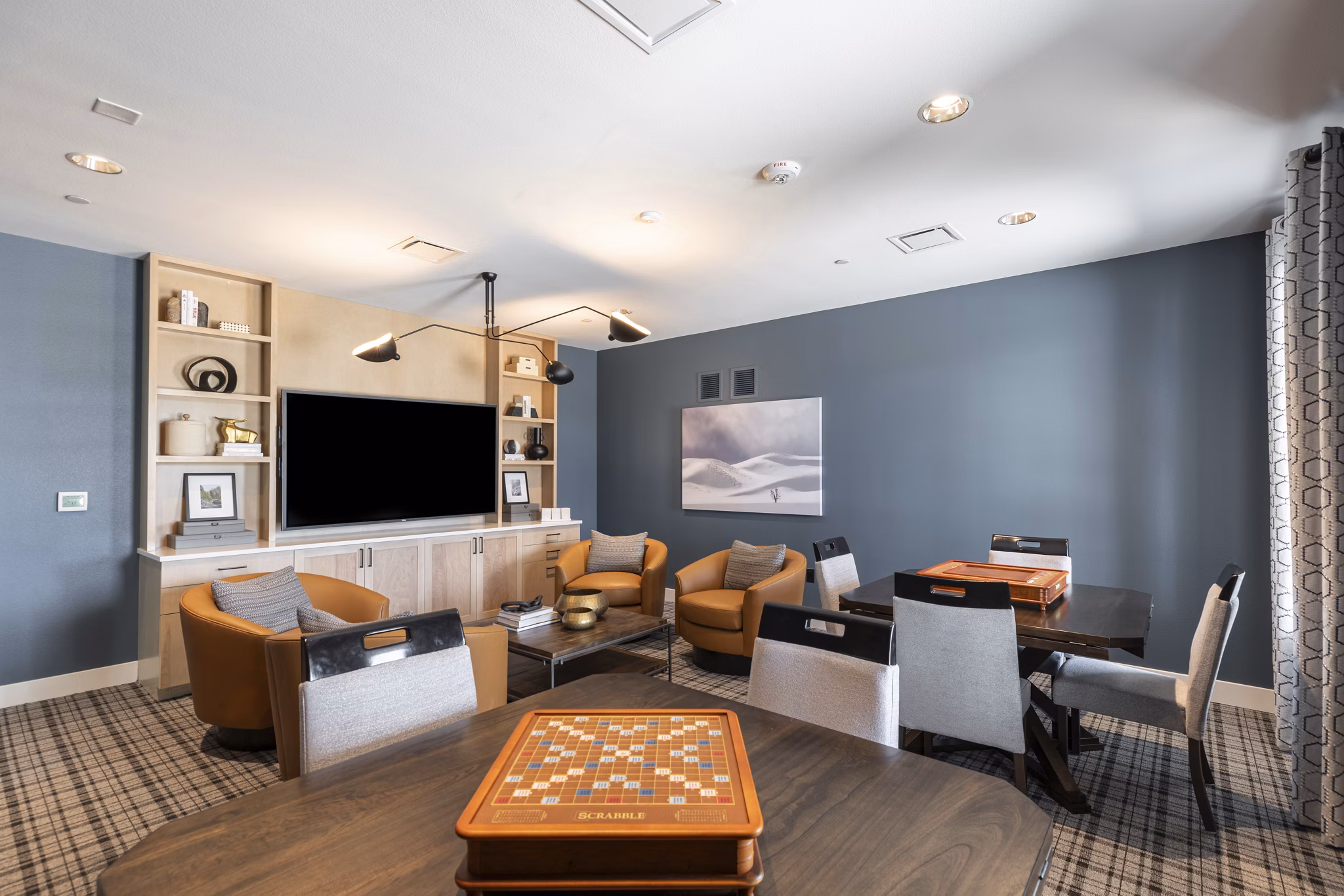 Modern clubhouse with stylish seating and decor at Avenida at Centerra Apartments