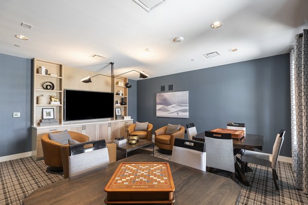 Modern clubhouse with stylish seating and decor at Avenida at Centerra Apartments