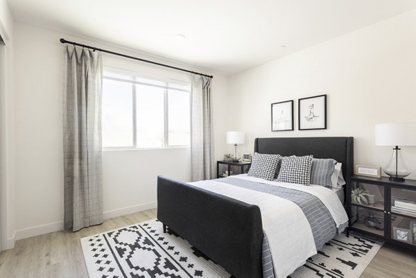 Cozy bedroom with stylish decor at Vello Valley BTR Single Apartment Townhomes