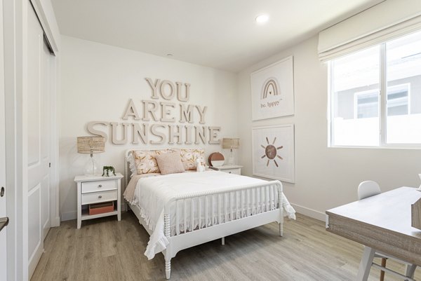 Spacious bedroom with modern design and natural light in Vello Valley BTR Single Apartment Townhomes