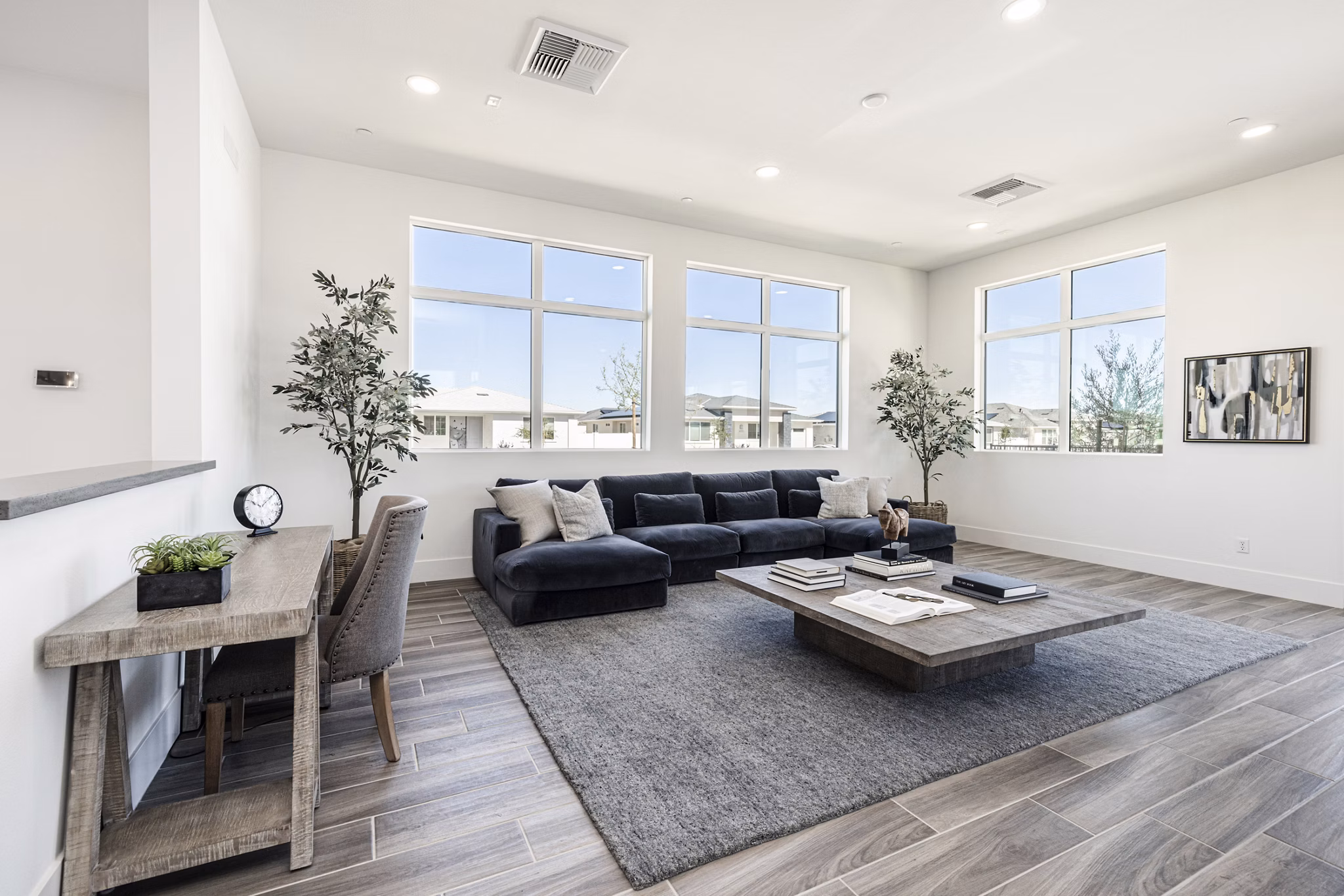 Clubhouse with modern decor and seating area at Vello Valley BTR Single Apartment Townhomes