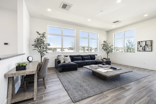 Clubhouse with modern decor and seating area at Vello Valley BTR Single Apartment Townhomes