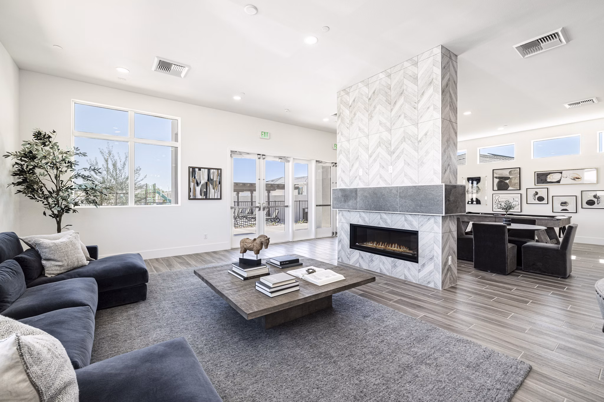 Vibrant clubhouse lobby with modern seating at Vello Valley BTR Single Apartment Townhomes