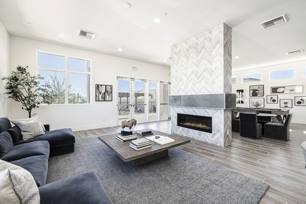 Vibrant clubhouse lobby with modern seating at Vello Valley BTR Single Apartment Townhomes