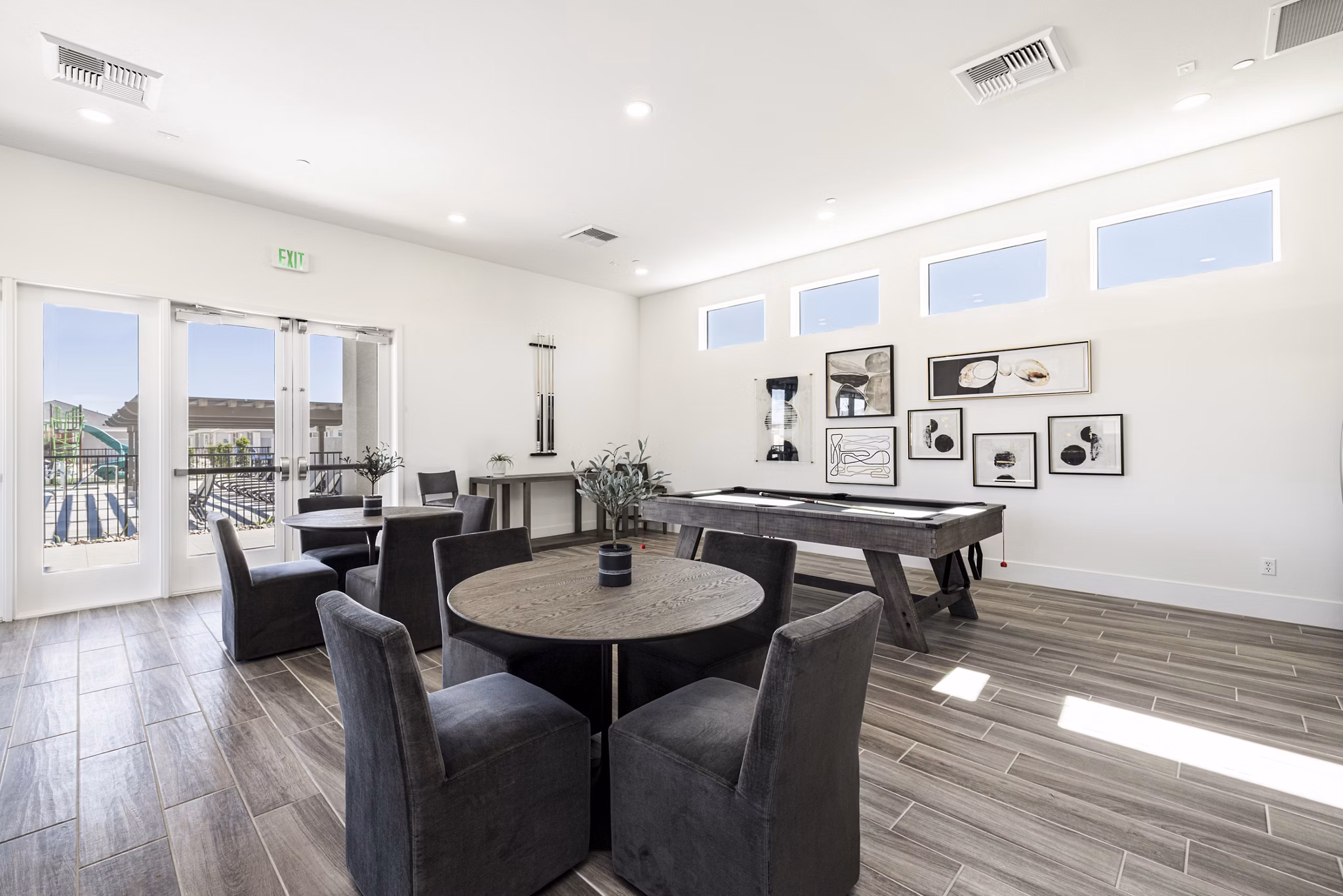 Clubhouse game room featuring pool table at Vello Valley BTR Townhomes