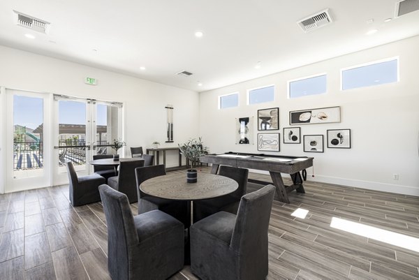 Clubhouse game room featuring pool table at Vello Valley BTR Townhomes