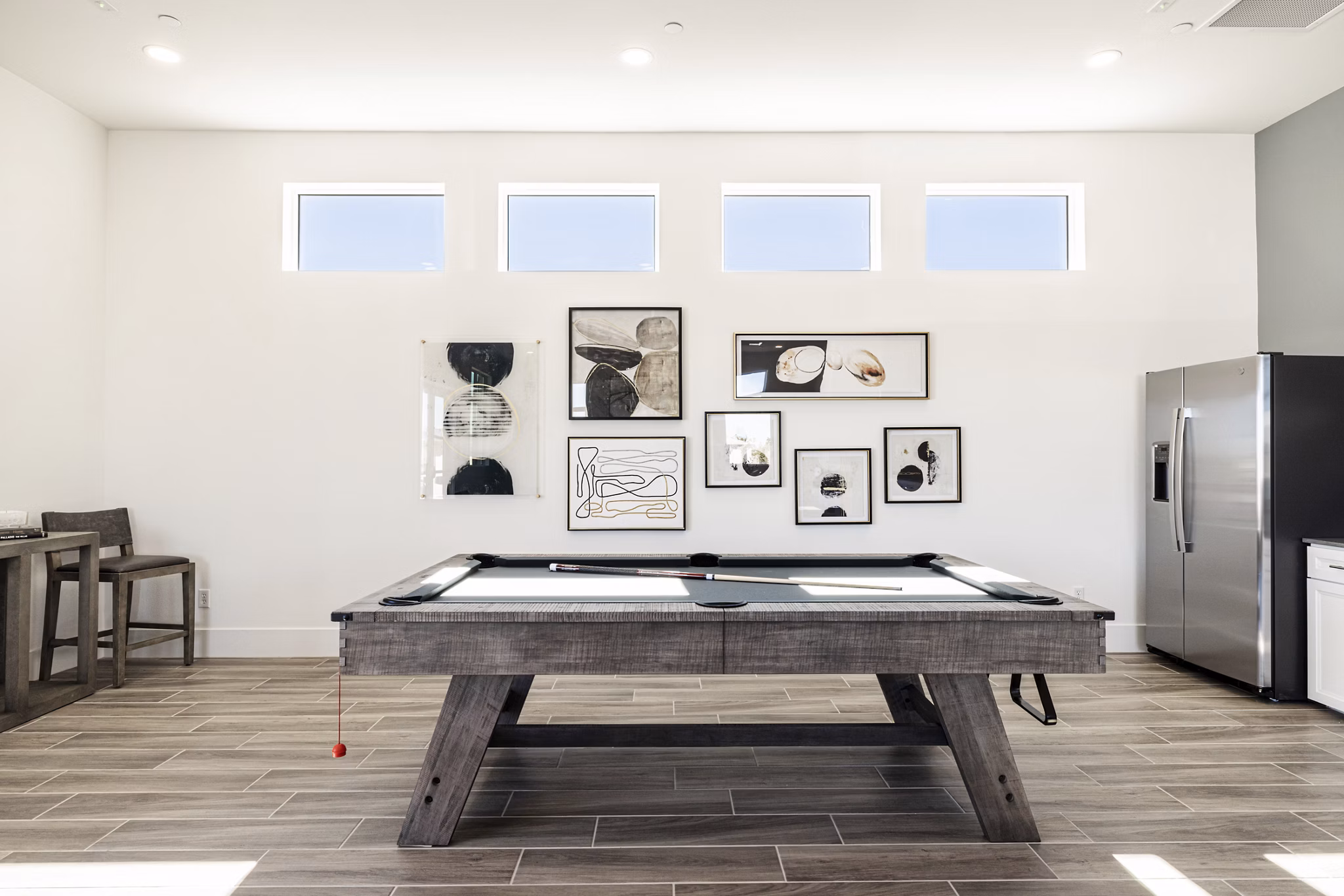 Clubhouse lobby with modern decor and open seating area at Vello Valley BTR Single Apartment Townhomes