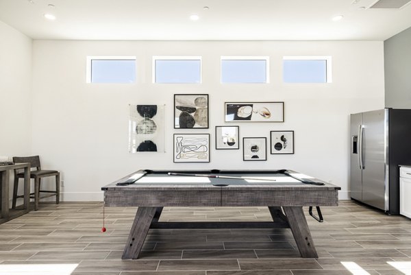 Clubhouse lobby with modern decor and open seating area at Vello Valley BTR Single Apartment Townhomes