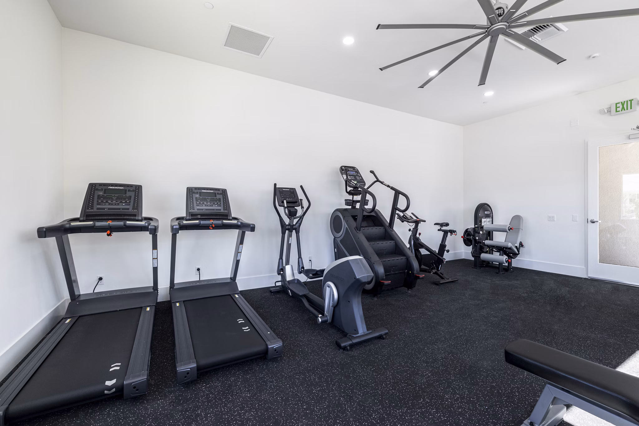 State-of-the-art fitness center at Vello Valley BTR Single Apartment Townhomes, offering modern exercise equipment and wellness space