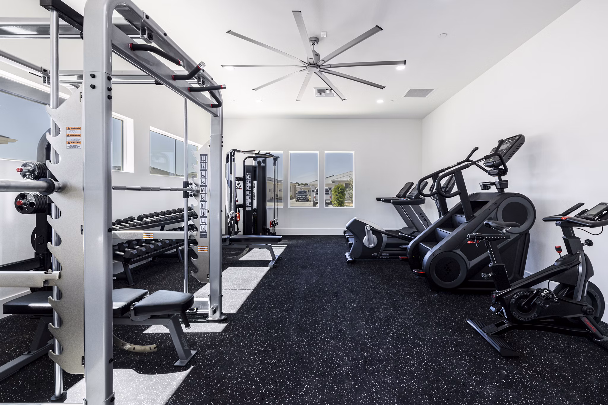 Modern fitness center with state-of-the-art equipment at Vello Valley BTR Single Apartment Townhomes