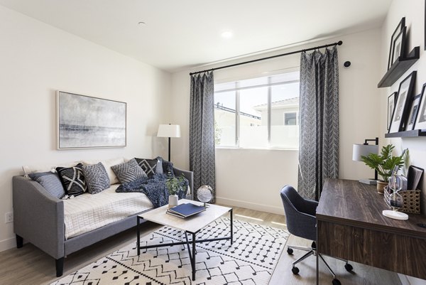 Stylish living room with modern furnishings in Vello Valley BTR Single Apartment Townhomes