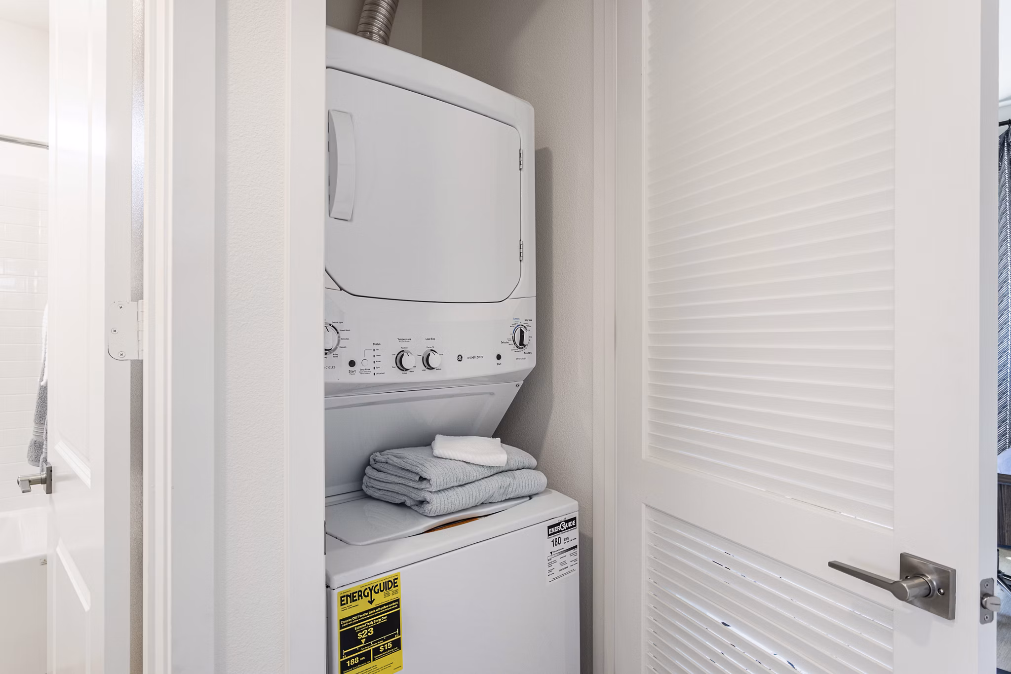 Laundry room featuring modern appliances at Vello Valley BTR Single Apartment Townhomes